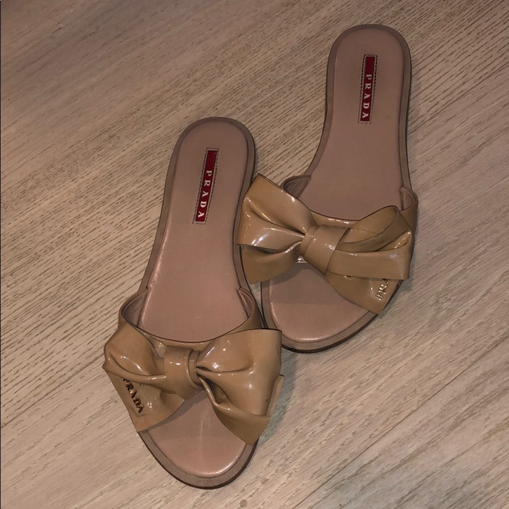 Nude Prada flip flops